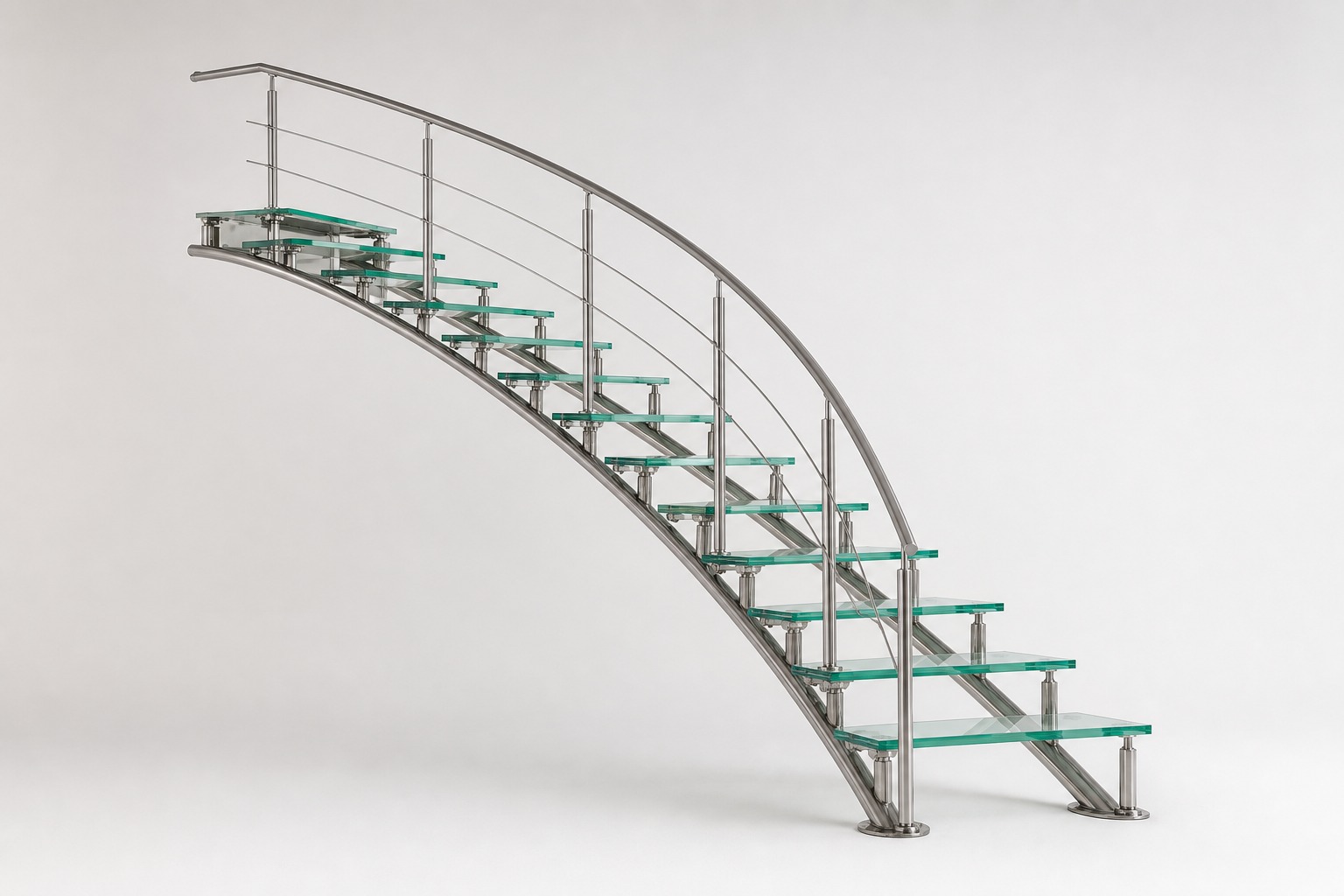 Curved glass-tread staircase with stainless posts and cable railing.